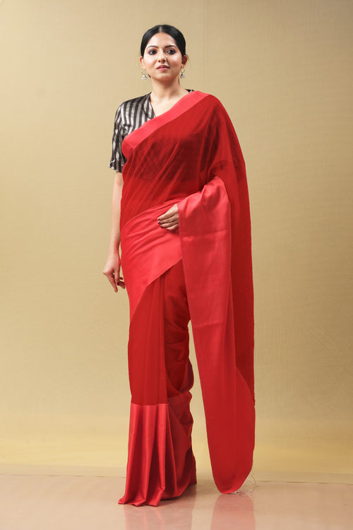 Red saree with red mushru silk border