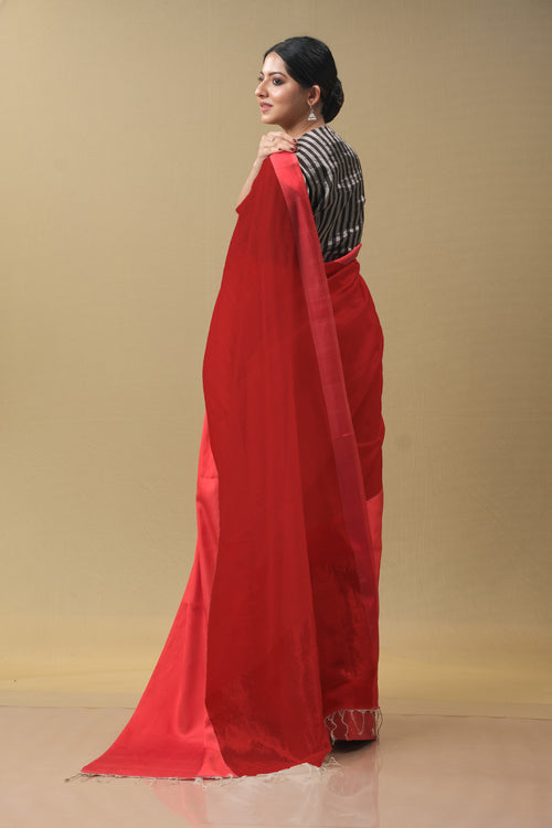 Red saree with red mushru silk border