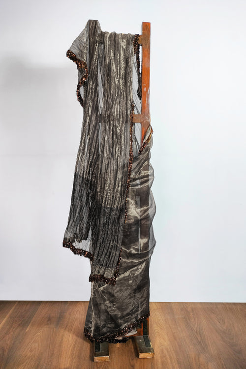 Audrey crushed silver tissue saree with Jhalar/fringe