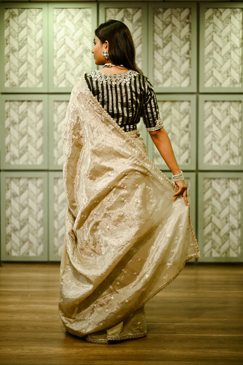 Glamorous Beige Tissue Embroidered Sari With black silver blouse 