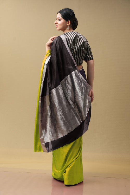 Black silk sari with broad green border (handwoven)