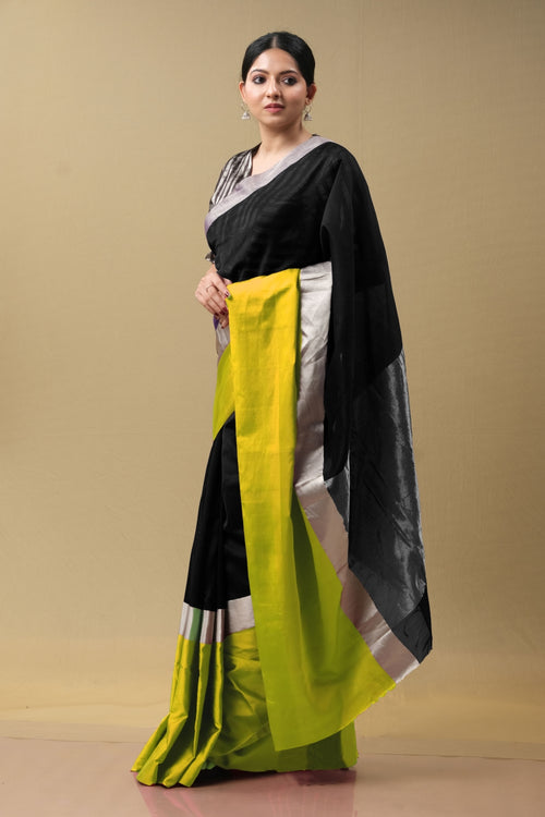 Black silk sari with broad green border (handwoven)