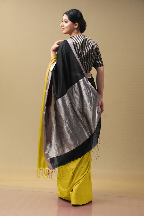 Mushru border black yellow party sari with stripe blouse piece