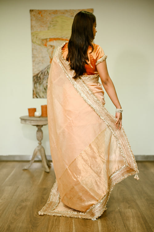 Cotton tissue pink sari with gold border
