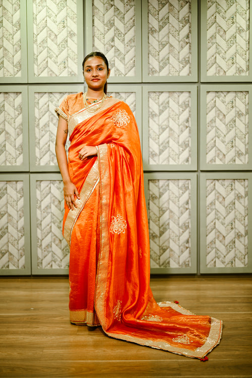 Orange silk handwoven sari with hand sequence work