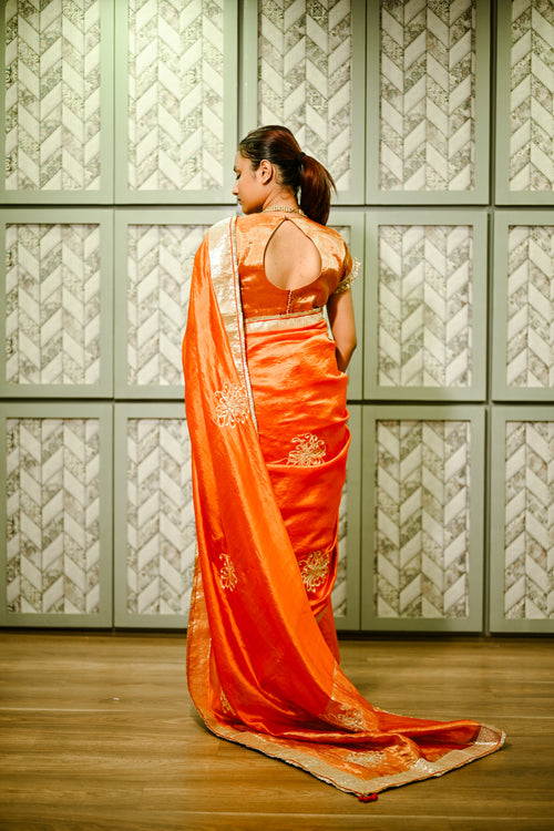 Orange silk sari with vintage hand-done sequin embroidery