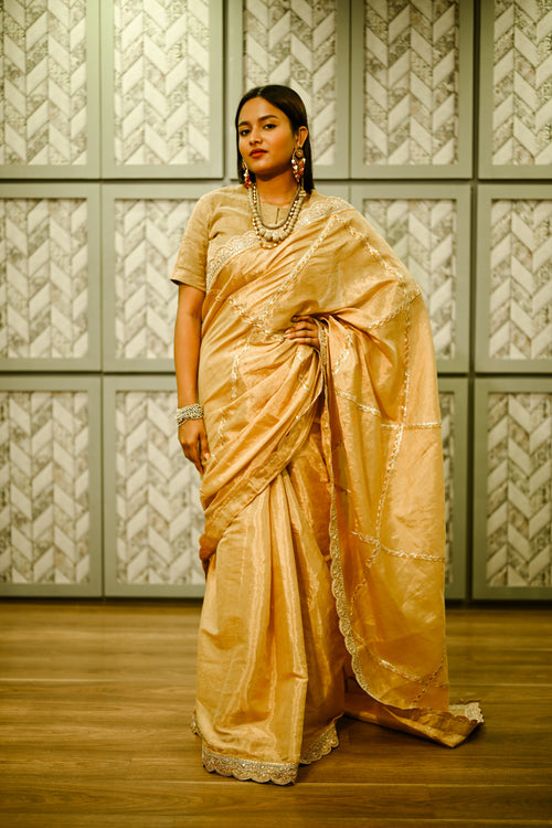 Gold tissue sari with gota patti