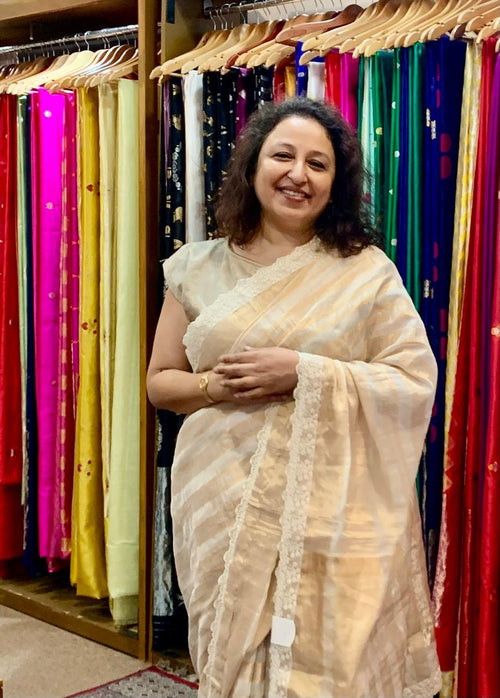 Offwhite and gold handwoven Tissue Silk Sari
