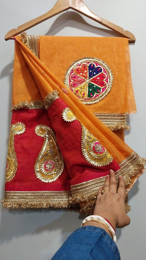 Truly festive saree in a beautiful tangerine color