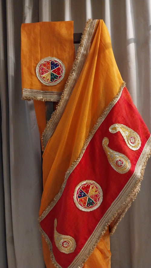 Truly festive saree in a beautiful tangerine color