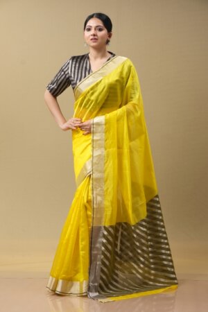 Yellow, chanderi silk sari wit silver diagonal buti design on the pallu