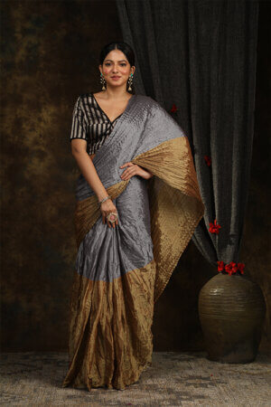 Half-and-Half Crush Tissue Sari in elegant combination of silver and gold , showcasing a unique blend of textures and traditional craftsmanship.