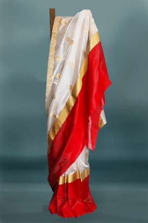 off-white with red broad border silk sari with red flower buta all over the sari